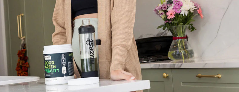 nuzest Good Green Vitality with shaker in kitchen
