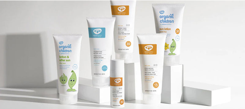 green people sun creams displayed on white background