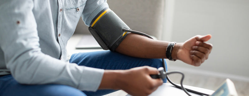 man checking for high blood pressure