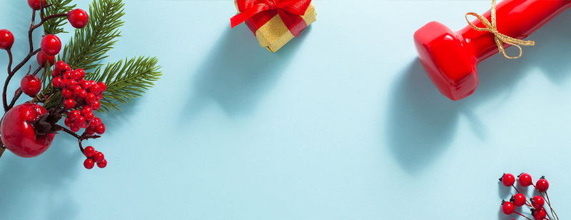 festive holly and dumbbells