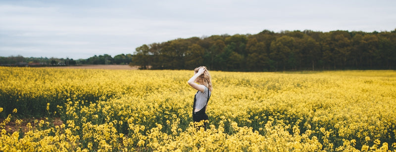 woman in field during hay fever season