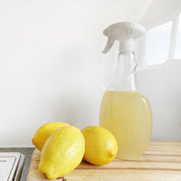 cleaning bottles with lemons