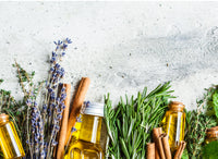 bottles of essential oils distilling