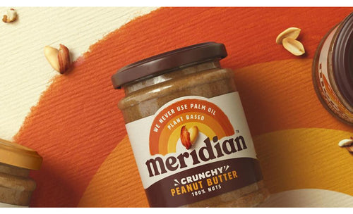 Meridian peanut butter with nuts and yellow and orange rainbow