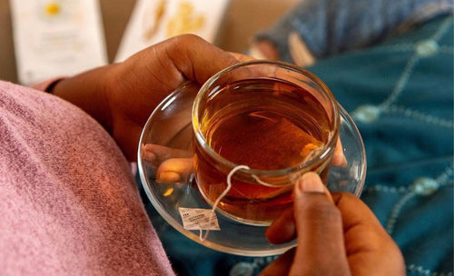 NutraTea Herbal Tea in a glass cup