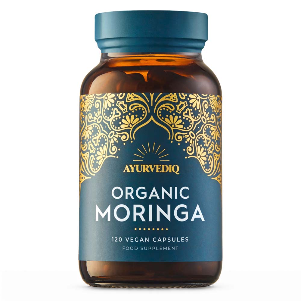 A bottle of Ayurvediq Organic Moringa food supplement, containing 120 vegan capsules.