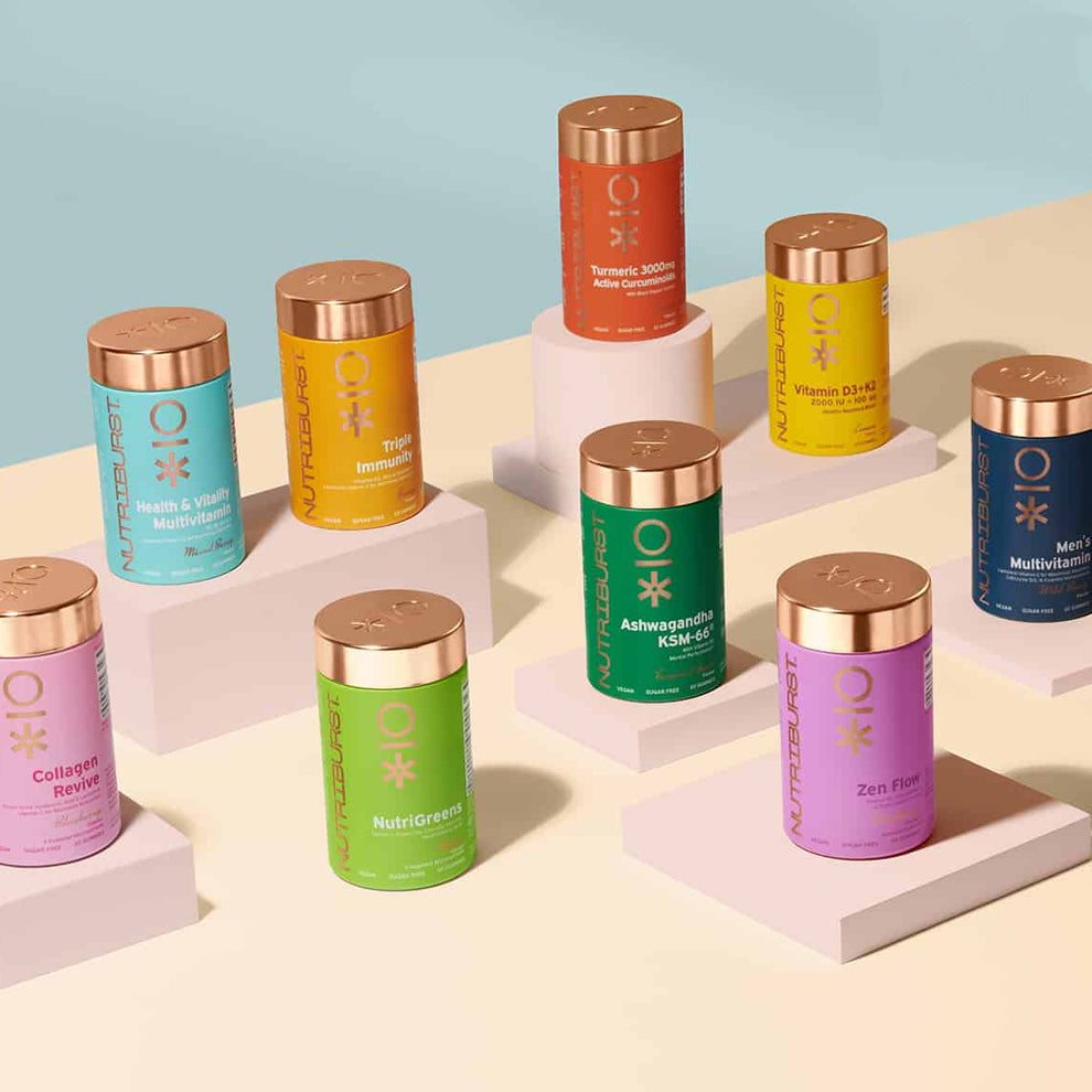 Assorted Nutriburst health supplement containers with colorful labels on a light background