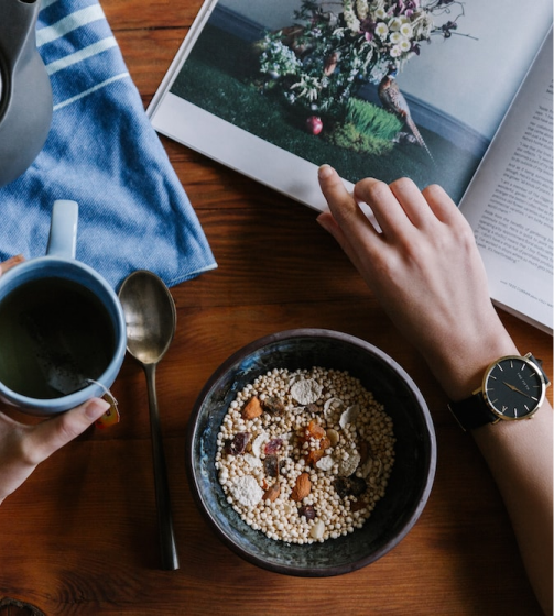 Bowl of health grains with cup of tea