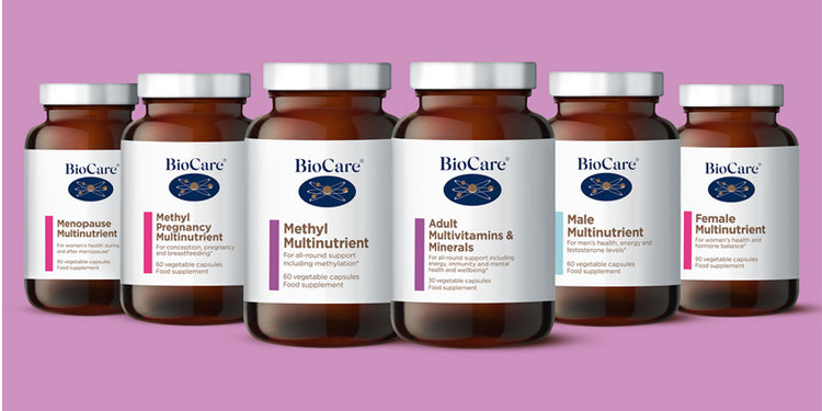 Selection of  Biocare supplement bottle on purple background