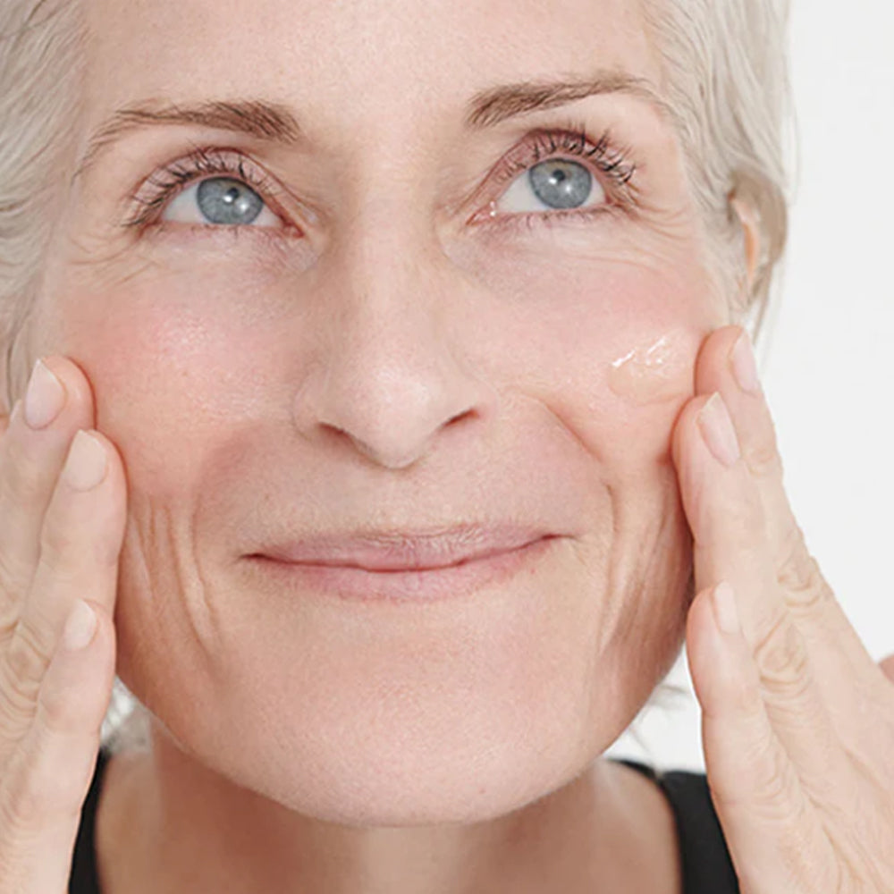 woman using Dr. Hauschka Regenerating Intensive Night Serum
