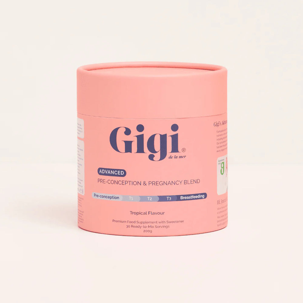 A pink cylindrical container of Gigi Advanced Pre-Conception & Pregnancy Blend dietary supplement.