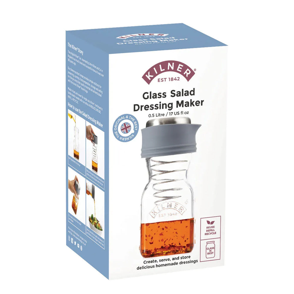 Kilner Glass Salad Dressing Maker product packaging box, showing a clear glass bottle with a gray lid and orange liquid inside, on a white background.