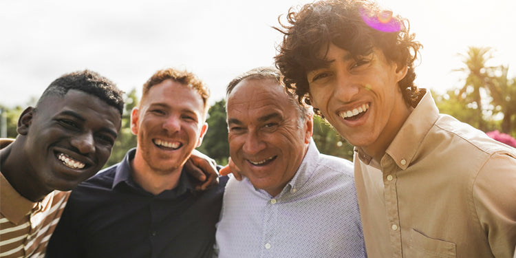 smiling group of multigenerational men