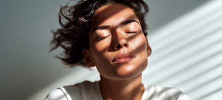 woman meditating in light and shade
