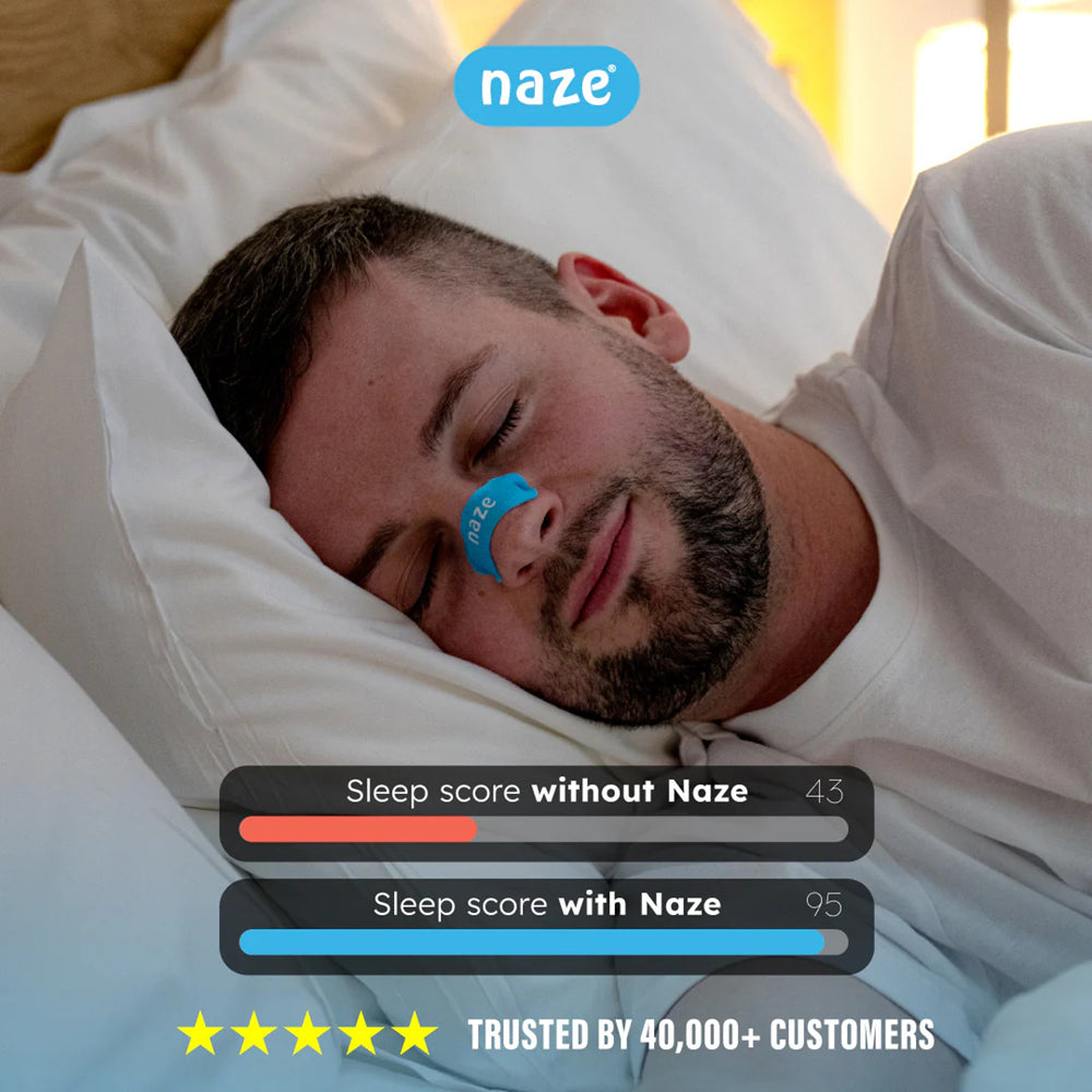 Man sleeping with a blue sleep mask, showing sleep score improvement with Naze product.
