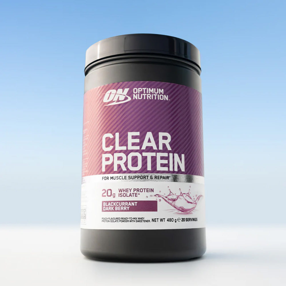 Optimum Nutrition Clear Protein container on a light blue background