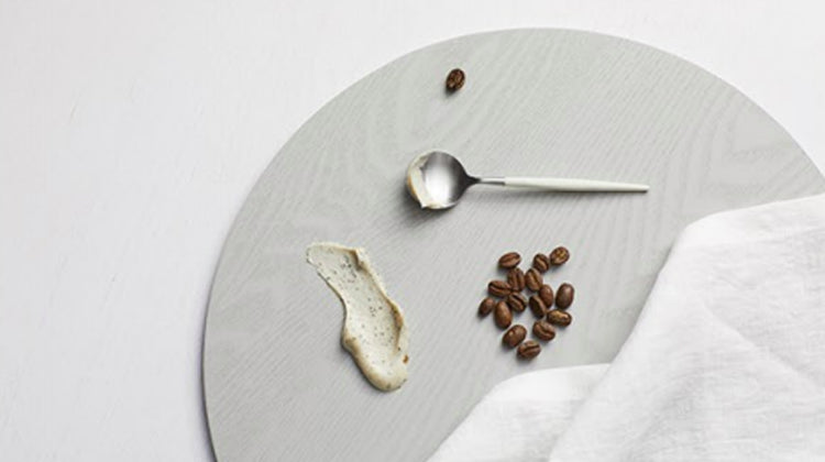 selection of natural skincare ingredients on a grey background