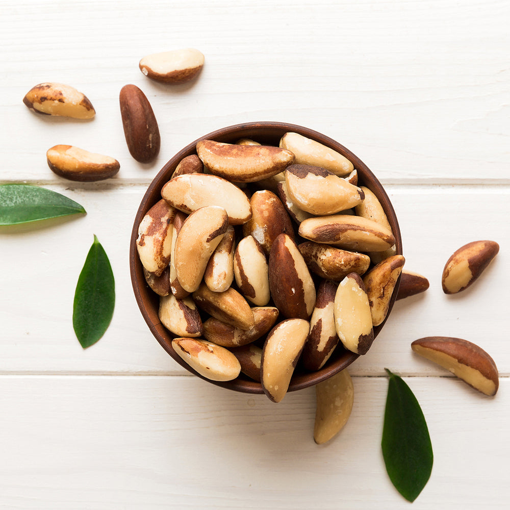 True Natural Goodness Organic Brazil Nuts in a wooden bowl