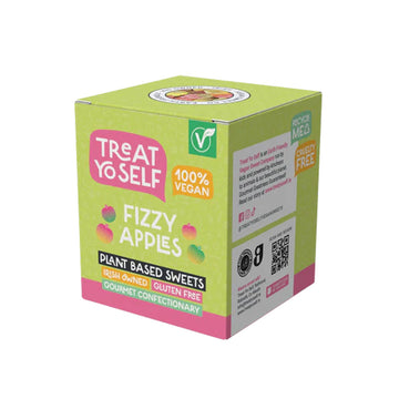 A box of Treat Yo Self Fizzy Apples plant-based sweets, featuring a light green and pink packaging design with illustrations of apple slices.