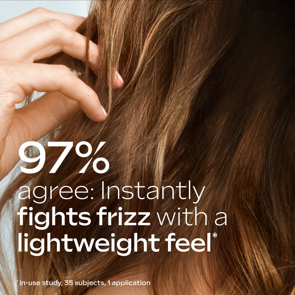Person with frizzy hair holding it, with text about product effectiveness on a light background