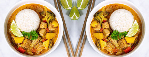 Tofu Mango Coconut Curry in white bowl with chopsticks