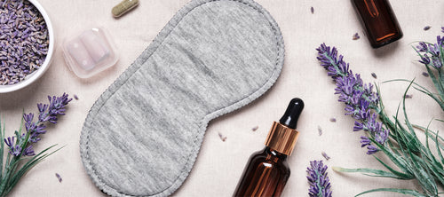 Image of a sleep mask, lavender and essential oils