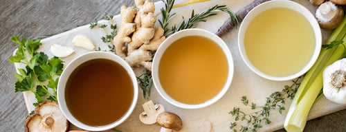 three bowls of various bone broths which have so many health benefits