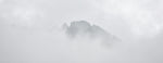 Clouds over a mountain