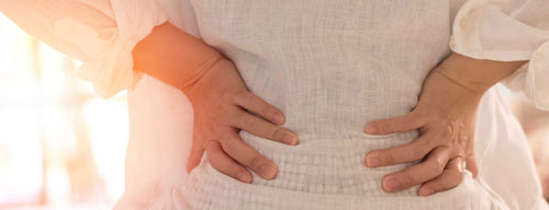 woman with joint complaint - sore back