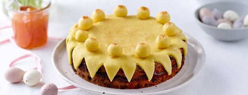 Simnel Cake decorated with yellow marzipan 
