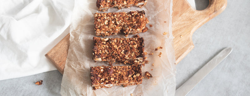 homemade granola bars on wooden chopping board