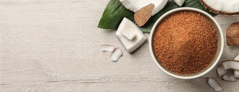 bowl of coconut palm sugar - a healthy natural alternatives to sugar