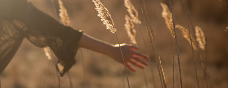 stress-free woman in a field 