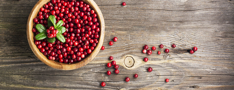 cranberries in wooden bowl