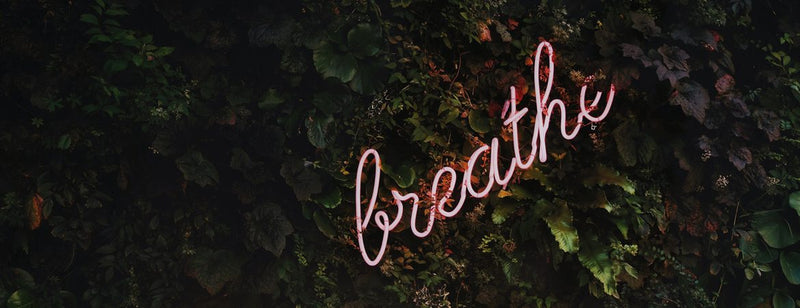 breathe neon light sign