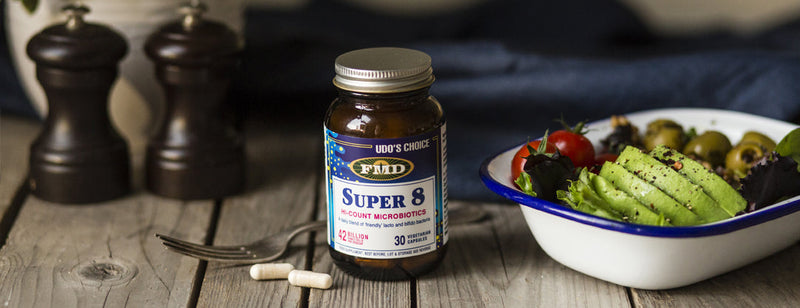 Udo's choice super 8 with a bowl of fresh fruit and vegetables 