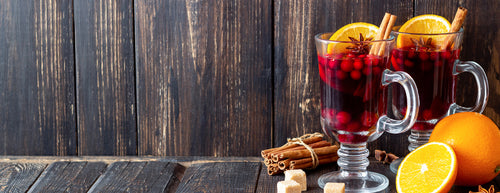 Cranberry Punch with orange slices and cinnamon stick