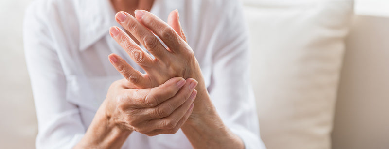 woman with arthritis pain in the hands