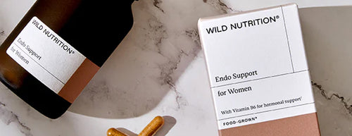 wild nutrition endo support supplement on a marble background