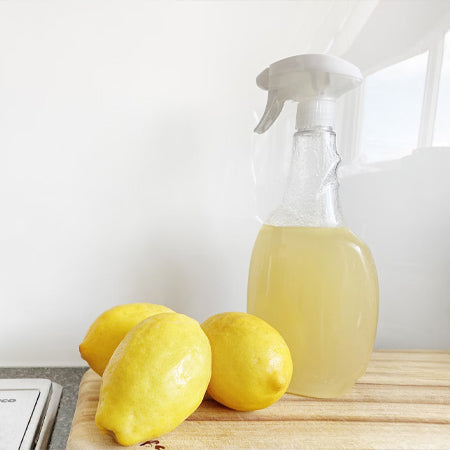 cleaning bottles with lemons
