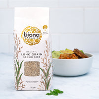 biona long grain brown rice with bowl of food and white tiles