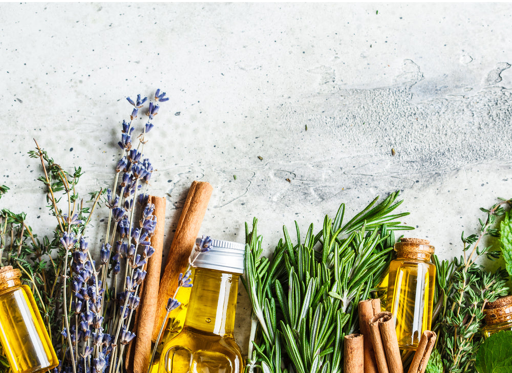 bottles of essential oils distilling