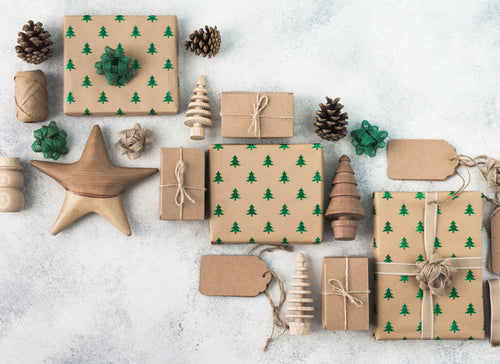 presents wrapped in natural wrapping paper with pine cones