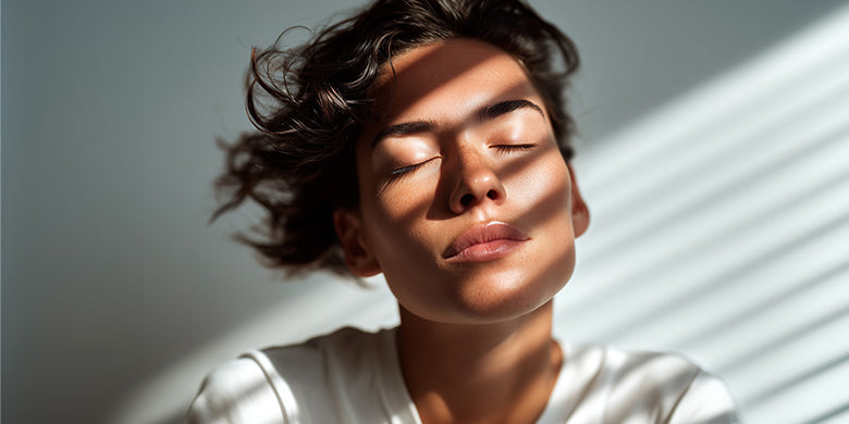 woman in meditation with light and shade