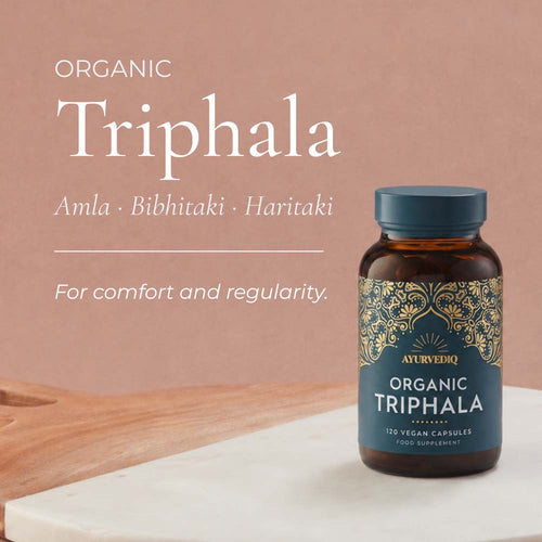 Ayurvedic Organic Triphala supplement bottle with ingredients.