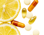 Orange and yellow supplements with slices of lemon