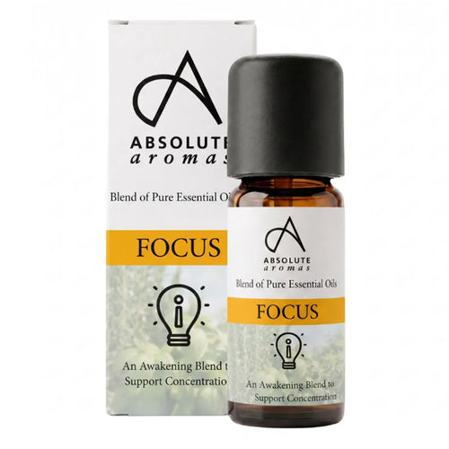 A bottle of Absolute Aromas Focus essential oil blend next to its retail box, featuring a white label with a yellow &