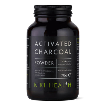 A black bottle of Kiki Health Activated Charcoal Powder, 70g, on a clean white background.
