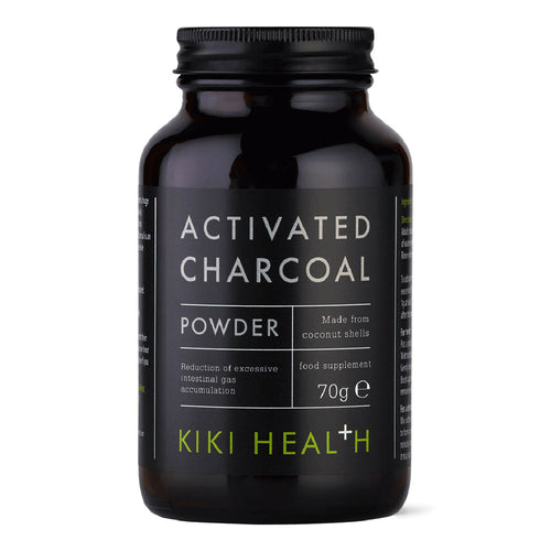 A black bottle of Kiki Health Activated Charcoal Powder, 70g, on a clean white background.