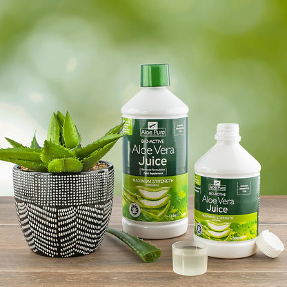 Aloe Pura Aloe Vera Juice 1 litre and 500ml bottles with aloe vera plant